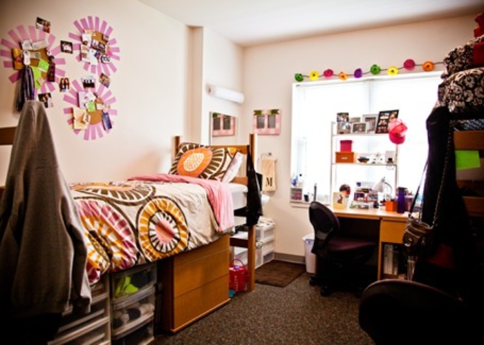 interior of student room showing beds and desk