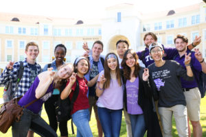 Group of Horned Frog Students smiling outside.