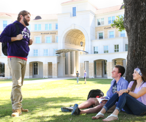 Link takes you to Transfer student housing steps. TCU students talking outdoors.